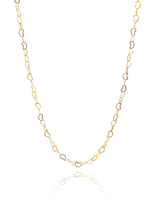 A gold-filled cable link chain necklace with a heart charm on a white background.