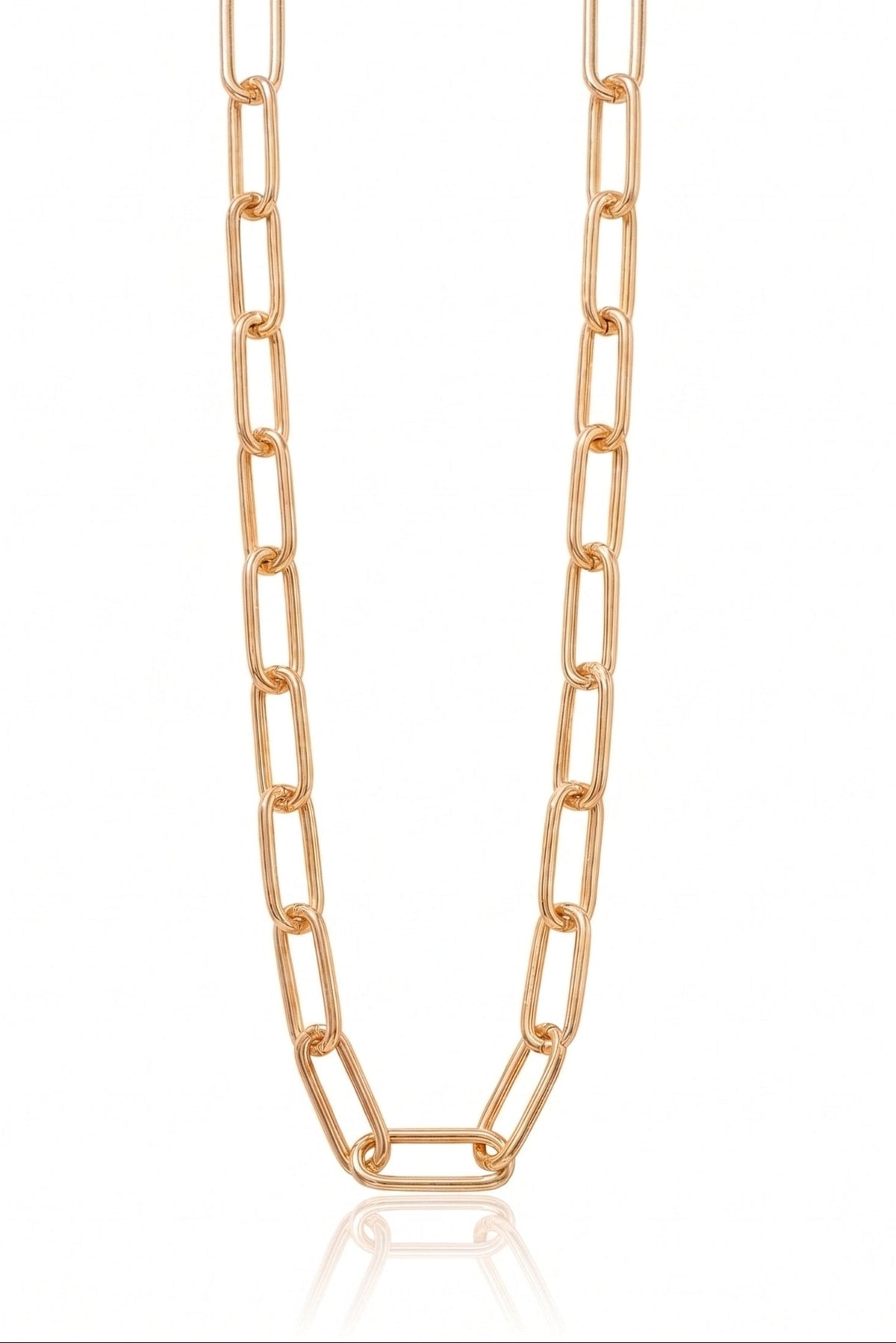 A rose gold paperclip chain necklace displayed vertically against a clean white background with a subtle reflection at the bottom.
